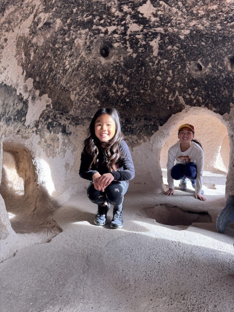 Exploring pueblos in Bandelier